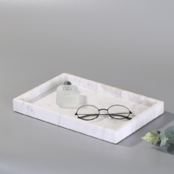 chic tray serves as an understated piece for the finest displays